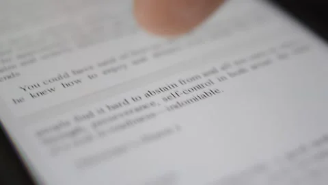 Iphone device with ebook. scroll book on iphone display. Video stock 254067354