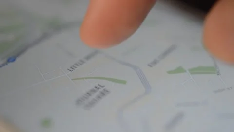 Iphone gps. google maps gps app. young man use iphone gps application. Stock Footage 249827201