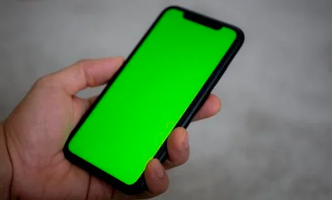 IPhone Hand Greenscreen Foto stock