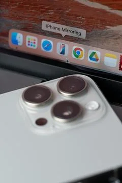 Iphone Mirroring app in macbook pro menu Stock Photos