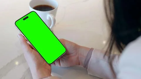 IPhone Pro 14 Isolated View Medium Wide Shot, Held in Woman's Hands Stock Photos