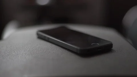 IPhone ringing inside Jeep. Stock Footage 93172846