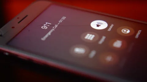 Iphone screen with 911 cal. emergency number in the dark. Video stock 232496706