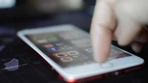 Iphone screen display swipe. man use gesture on iphone device. Video stock 240311411