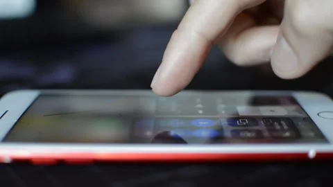 Iphone screen display swipe. man use gesture on iphone device. Video stock 240311471