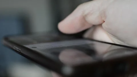 Iphone scroll. caucasian man scroll phone social network app on display. Video stock 254067928