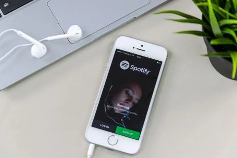 IPhone SE with Spotify App Stock Photos