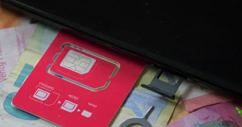 Iphone smartphone with nano sim card with euros money - 4K Prores 422 HQ Stock Footage 248863593