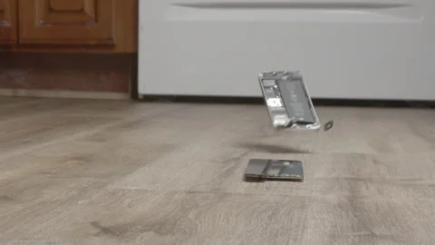 Iphone smashes on floor after drop 스톡 동영상 168322416