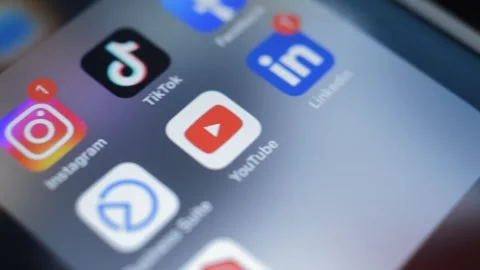 Iphone social network on the display. social media network on the iphone screen. Stock Footage 248686187