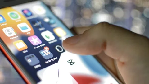 Iphone swipe in city night background. young man swipe iphone screen. 스톡 동영상 236376729