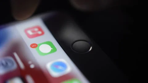 Iphone touch id for fingerprint identification. unlock iphone with id. Stock Footage 234284885