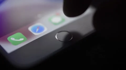 Iphone touch id for fingerprint identification. unlock iphone with id. Stock Footage 234285556