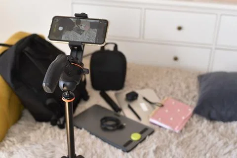 IPhone on tripod photographing flat lay arrangement Stock Photos