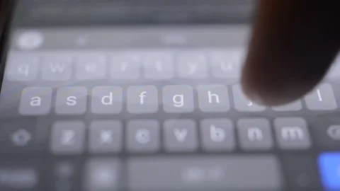 Iphone typing in night. man's hand type on the iphone keyboard. Video stock 232674479