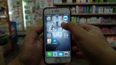 Iphone user opening Pinterest application. Stock Footage 88376286