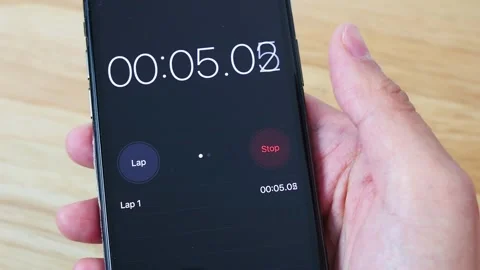 IPhone user uses Stopwatch on iOS Stock Footage 141318134