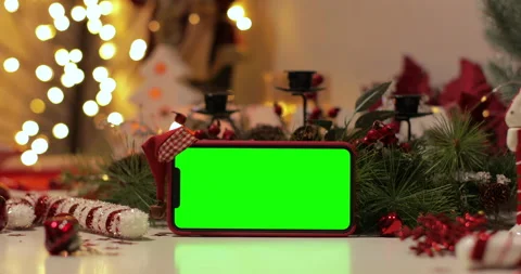 IPhone Xs max in Horizontal orientation with green screen on a background Video stock 144377371