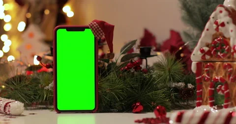 IPhone Xs max in Vertical orientation with green screen. Christmas background Video stock 144376373
