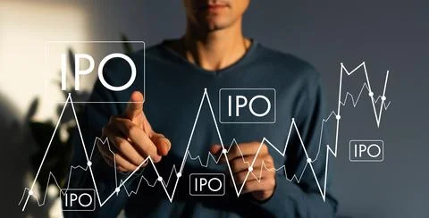 IPO - Initial Public Offering concept with hand pressing a button on blurred Stock Photos
