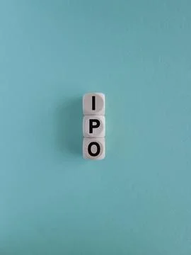 IPO- Initial Public Offering symbol. Concept word IPO on wooden cubes. Stock-Fotos