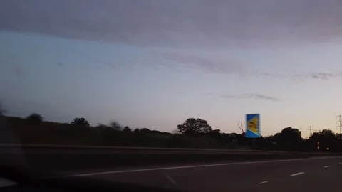 Ipswich to Luton Window View of Motorways and Traffic During Sunset Stock Footage 315079364