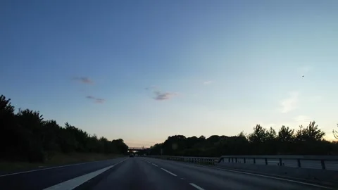 Ipswich to Luton Window View of Motorways and Traffic During Sunset Stock Footage 315080178