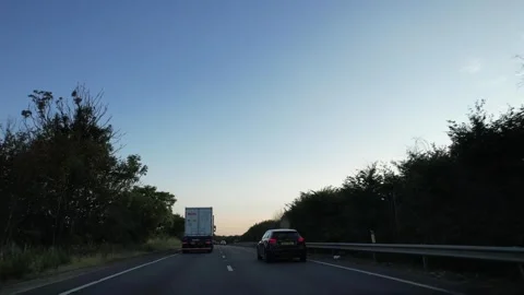 Ipswich to Luton Window View of Motorways and Traffic During Sunset Stock Footage 315089730
