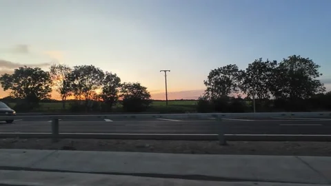 Ipswich to Luton Window View of Motorways and Traffic During Sunset Stock Footage 315089951