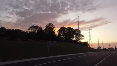 Ipswich to Luton Window View of Motorways and Traffic During Sunset Stock Footage 315093348