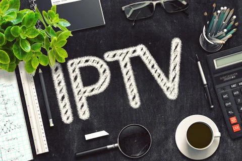 IPTV - Text on Black Chalkboard. 3D Rendering Illustrazione stock