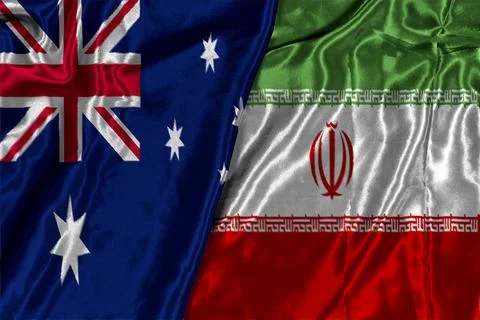 Iran and Australia two flags textile cloth, fabric texture 写真素材