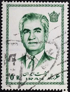 IRAN - CIRCA 1972: A stamp featuring Mohammad Reza Pahlavi, the last Shah b.. Stock Photos