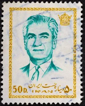 IRAN - CIRCA 1972: A stamp featuring Mohammad Reza Pahlavi, the last Shah b.. Stock Photos