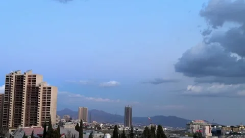 Iran flag waving makes panoramic view of Tehran cityscape urban skyline and 스톡 동영상 319606923