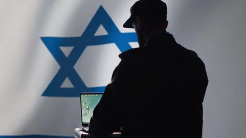 Iran IDF army operator uses software on laptop to communicate information Stock Footage 278293714