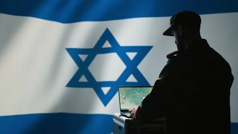 Iran IDF army operator uses software on laptop to communicate information Stock Footage 278375984