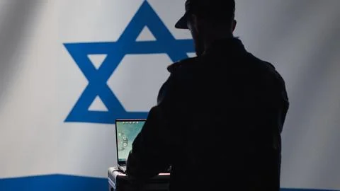 Iran IDF army operator uses software on laptop to communicate information Stock Photos