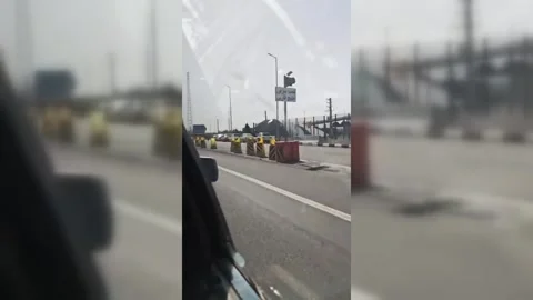 Iran: Long Queues at Petrol Stations as Iranians Seek Fuel Amid Strikes Video stock 329842652