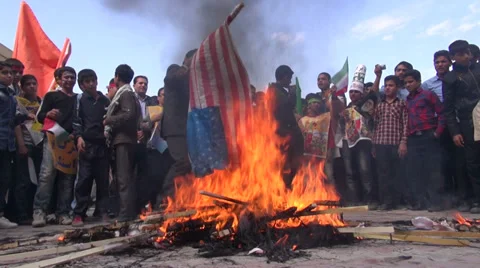 Iran, students burn American flag during anti Western rally, protest Stock Footage