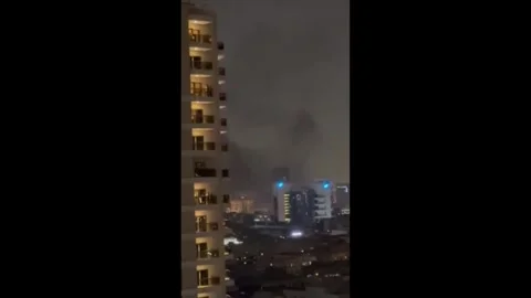 Iran War: Fire Breaks Out Near US Consulate In Dubai After Drone Strike Video stock 330113855