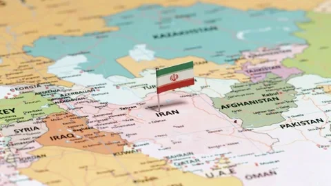 Iranian flag pin on world map with macro camera movement Stock Footage 333485512