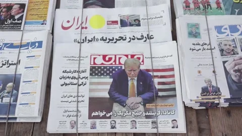 Iranian newspapers react to Trump's return to White House, Tehran, IR - 21 Jan 2 Stock Footage 299567744