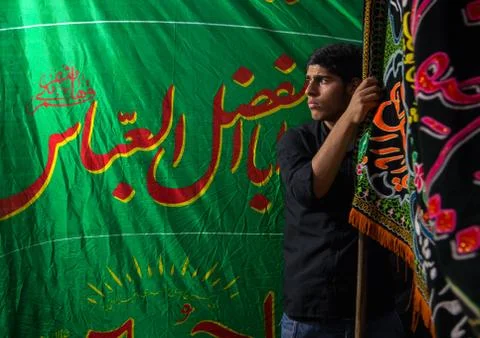 Iranian shiite muslim man in the bazaar to commemorate the martyrdom anniversary Stock Photos