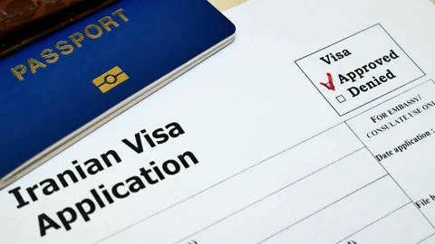 Iranian visa application getting denied with a red marker Stock Footage 332725197