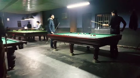 Iranian young generation play 8 ball in billiard clubs after removing of ban Stock Footage 58952329