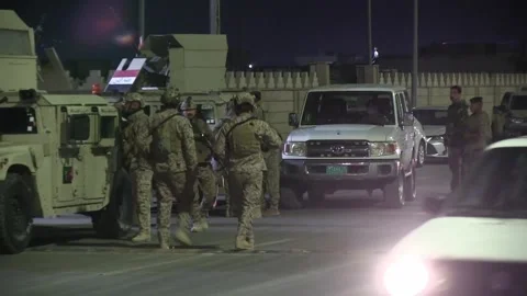 Iraq: Rocket attack targets military base near Kirkuk airport in northern... Stock Footage 330709457