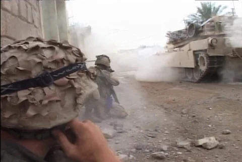 Iraq War - Tank fires at enemy in urban warfare slo mo Stock Footage