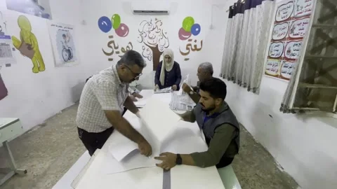 Iraqi armed forces vote early in parliamentary elections to be held on Tuesday,  Stock Footage 320846765