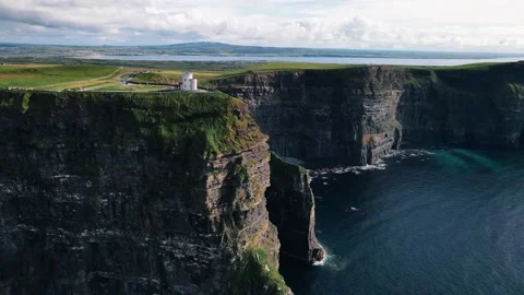 Ireland, Cliffs of Moher - drone shot of a beautiful coastline with stunning cli Stock Footage 290048814